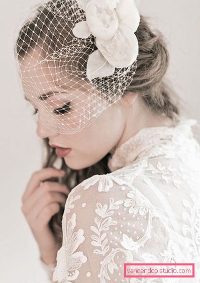 Acconciature da sposa per capelli medi con un velo