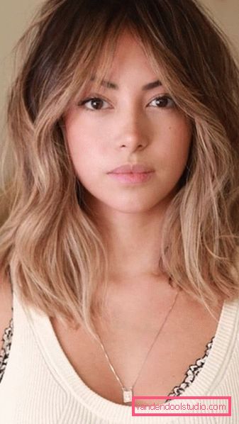 Acconciature da donna per capelli lunghi per viso tondo