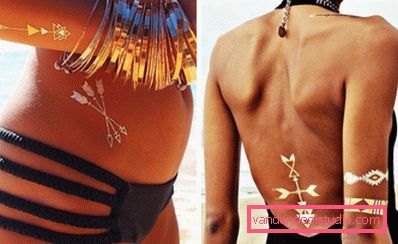 tatuaggio flash dorato su pelle scura tatuaggio flash dorato su pelle scura