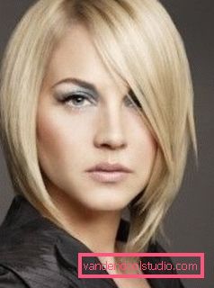 tagli di capelli lunghi per capelli medi Tagli di capelli femminili popolari con frangia lunga e obliqua per capelli medi