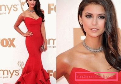 riccioli su un lato nella posa di Nina Dobrev riccioli su un lato nei capelli di Nina Dobrev