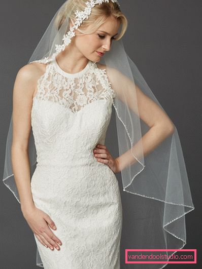 Acconciature da sposa con un velo su media