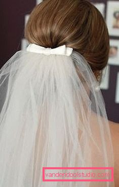Acconciature da sposa con un velo in media