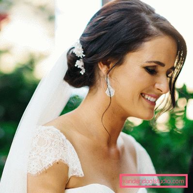 Acconciature da sposa con un velo in media