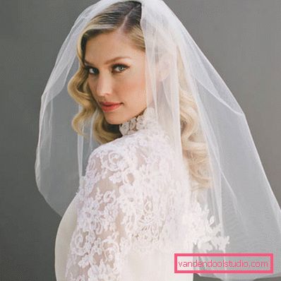 Acconciature da sposa con un velo in media